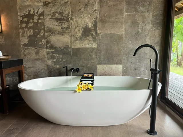 Freestanding bathtub in a Bali villa bathroom